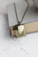 Load image into Gallery viewer, Book Locket Necklace | Cream Rose Charm